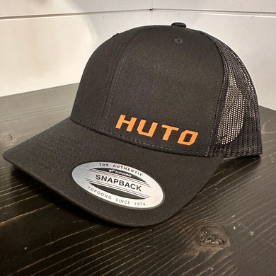 Huto Writing Logo Trucker Hat