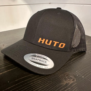 Huto Writing Logo Trucker Hat